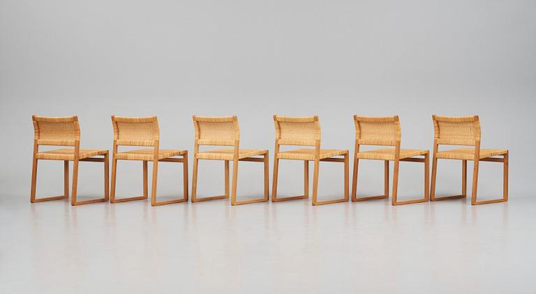 Børge Mogensen, a set of six oak and rattan 'BM61' chairs and a pair of BM62, Fredericia, Denmark, 1950s.