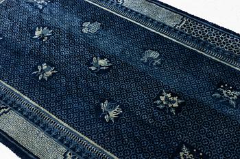 An antique Baotou carpet, north China, c. 257 x 155 cm.