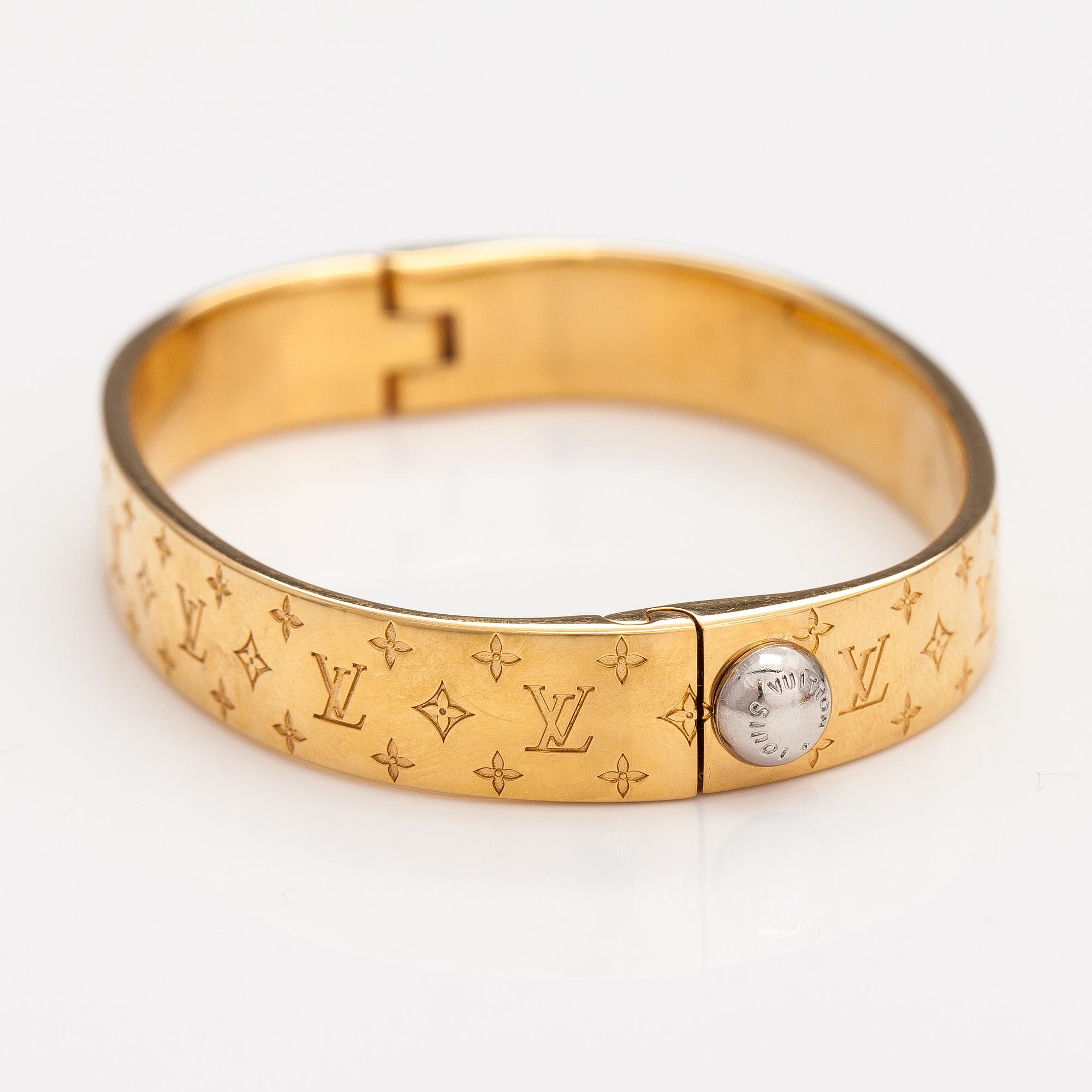 Louis Vuitton Nanogram cuff bracelet. Marked Louis Vuitton Paris Italy. Bukowskis