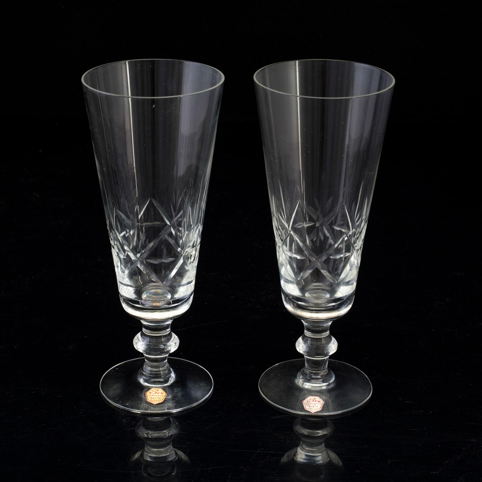 A set of twelve mid 20th century champagne glasses by Sea Glasbruk Kosta.