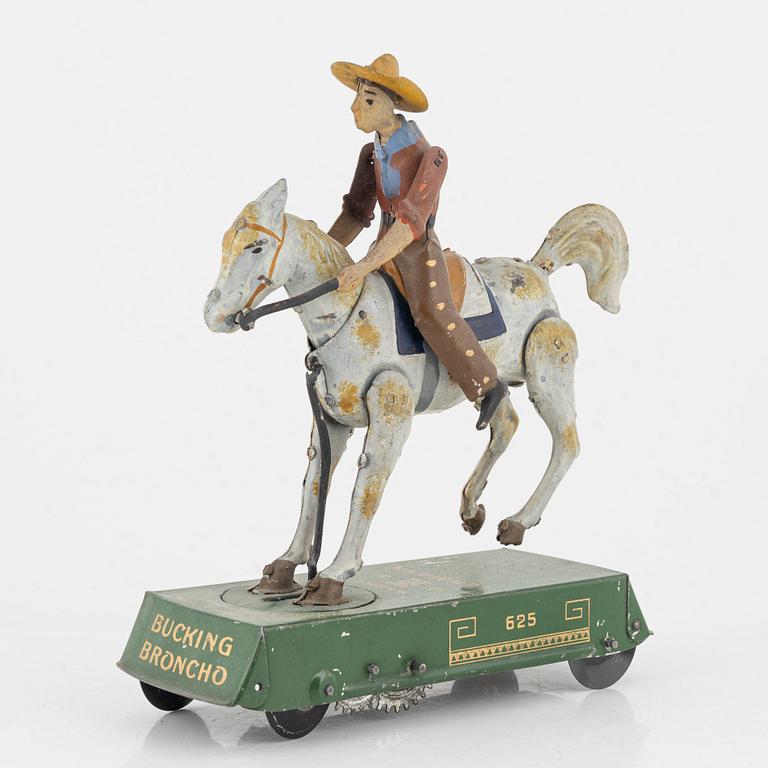 Lehmann, A tinplate 'Bucking Broncho 625' Germany. In production from 1903.