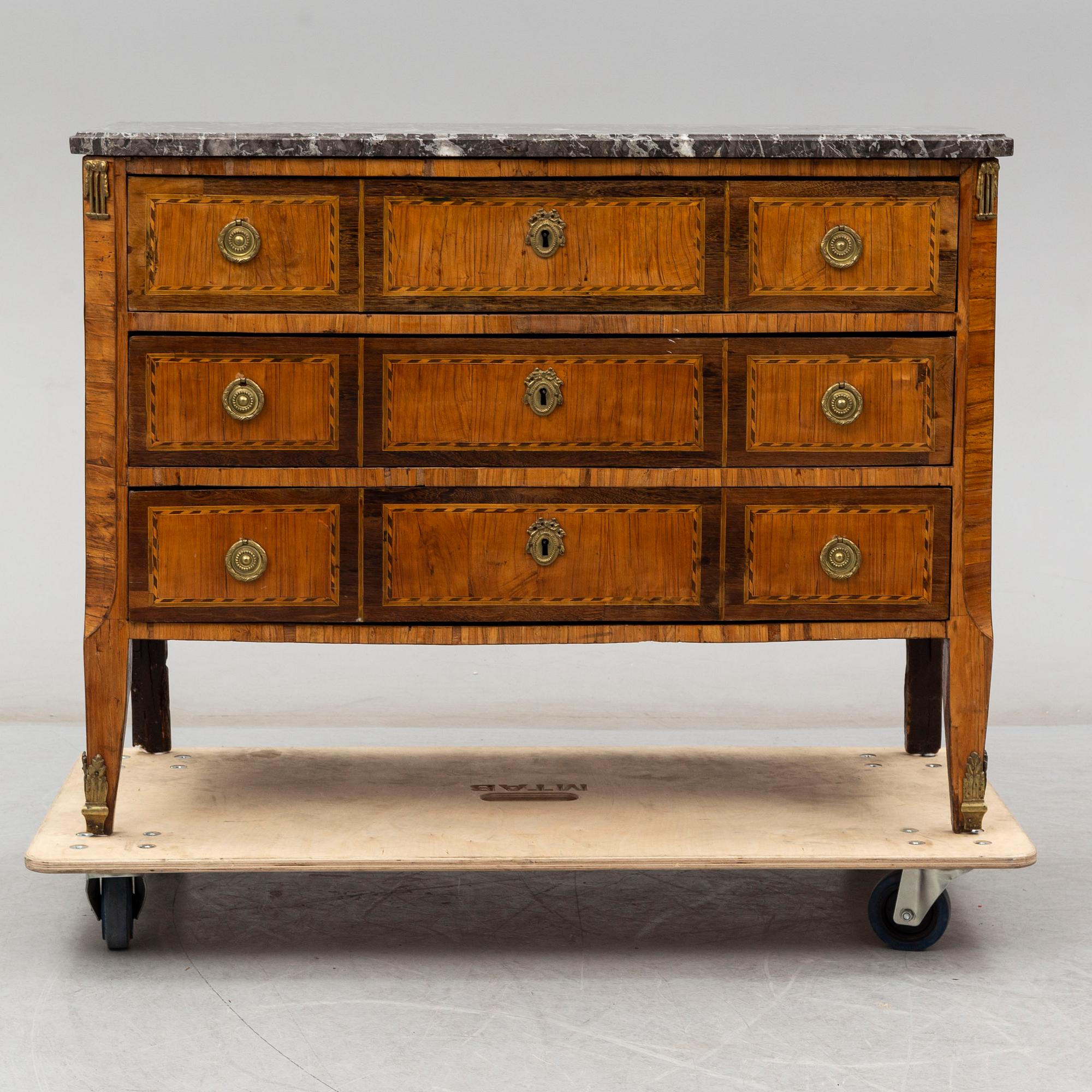 A late 18th century Louis XVI chest of drawers.