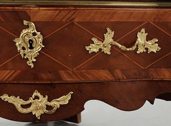 A Swedish Rococo 18th Century corner commode.