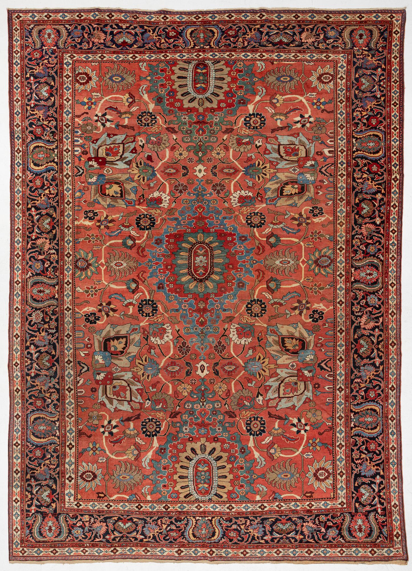 A Sultanabad carpet, west Persia c. 530 x 378 cm.