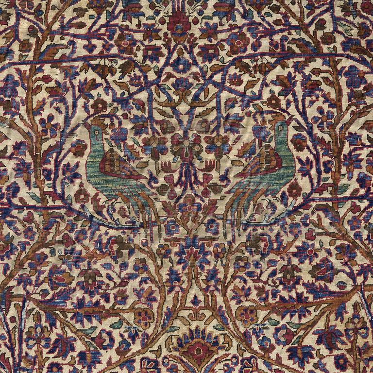 A CARPET, a semi-antique silk Kashan, ca 198,5 x 137 cm.
