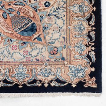 An oriental carpet, circa 390 x 302 cm.