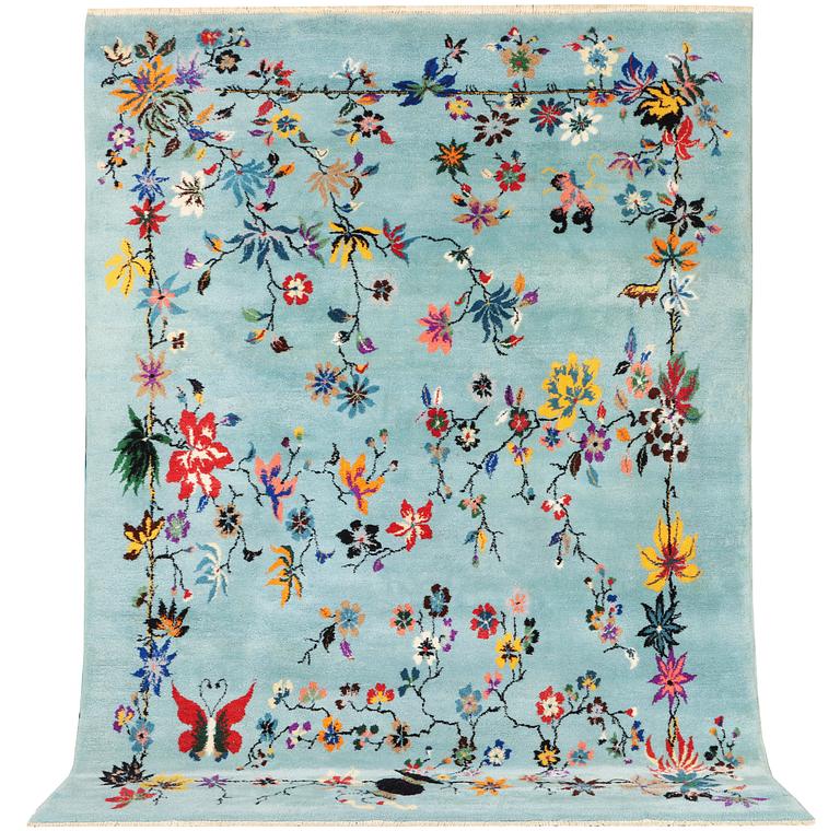 An oriental carpet, a. 370 x 261 cm.