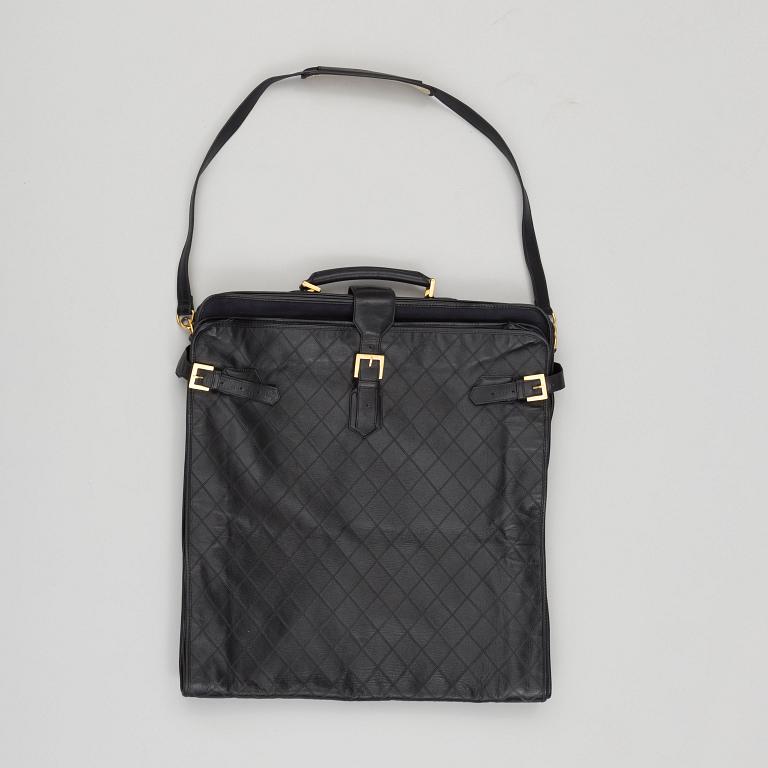 a CHANEL garment bag.