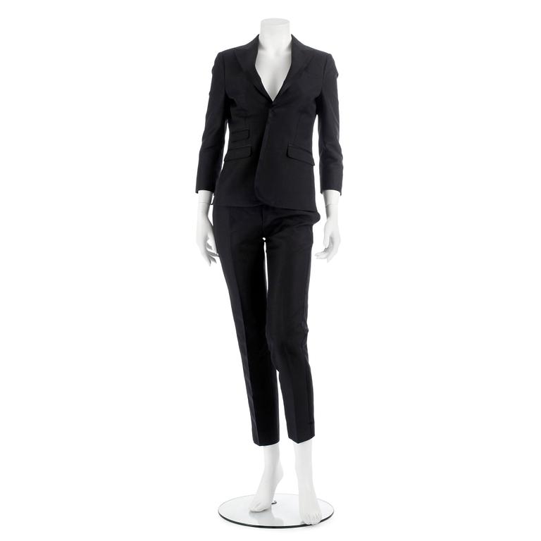 DSQUARED, a black cotton and silk two-piece suit consisting of jacket and pants. Size 42.