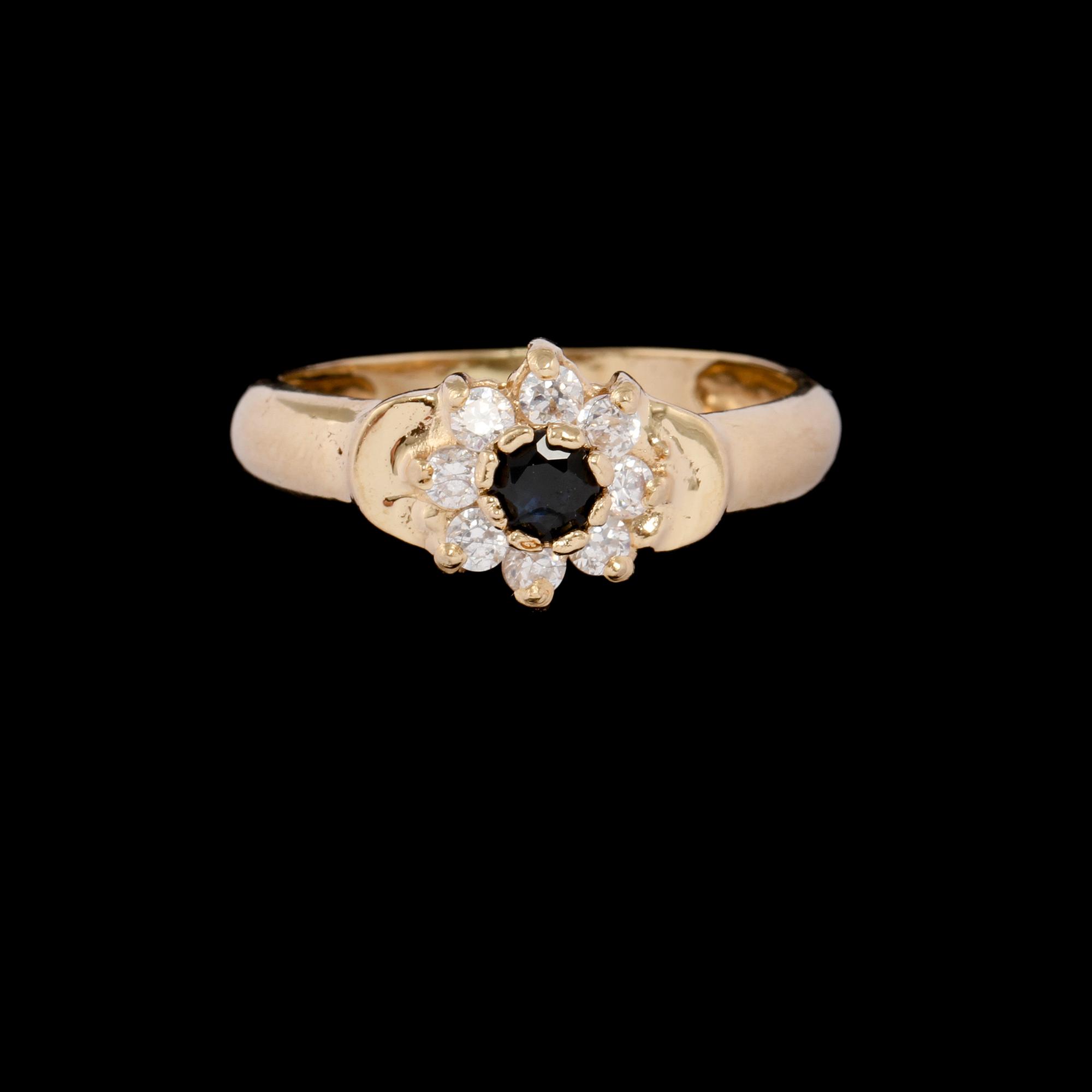 RING, 18k guld med ovalslipad rubin samt 8 briljantslipade diamanter, totalt ca 0.08 ct. Vikt 3 g.
