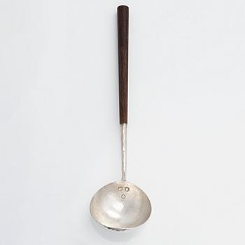 Tapio Wirkkala, a sterling silver and rosewood punch ladle, Kultakeskus, Hämeenlinna, Finland 1972.