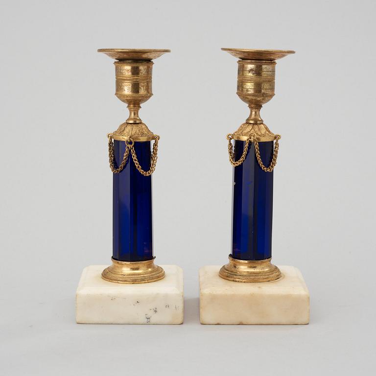 A pair of late Gustavian circa 1800 candlesticks.