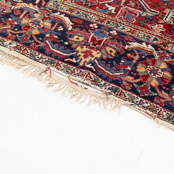 A semi antique Heris carpet, c. 345 x 255 cm.