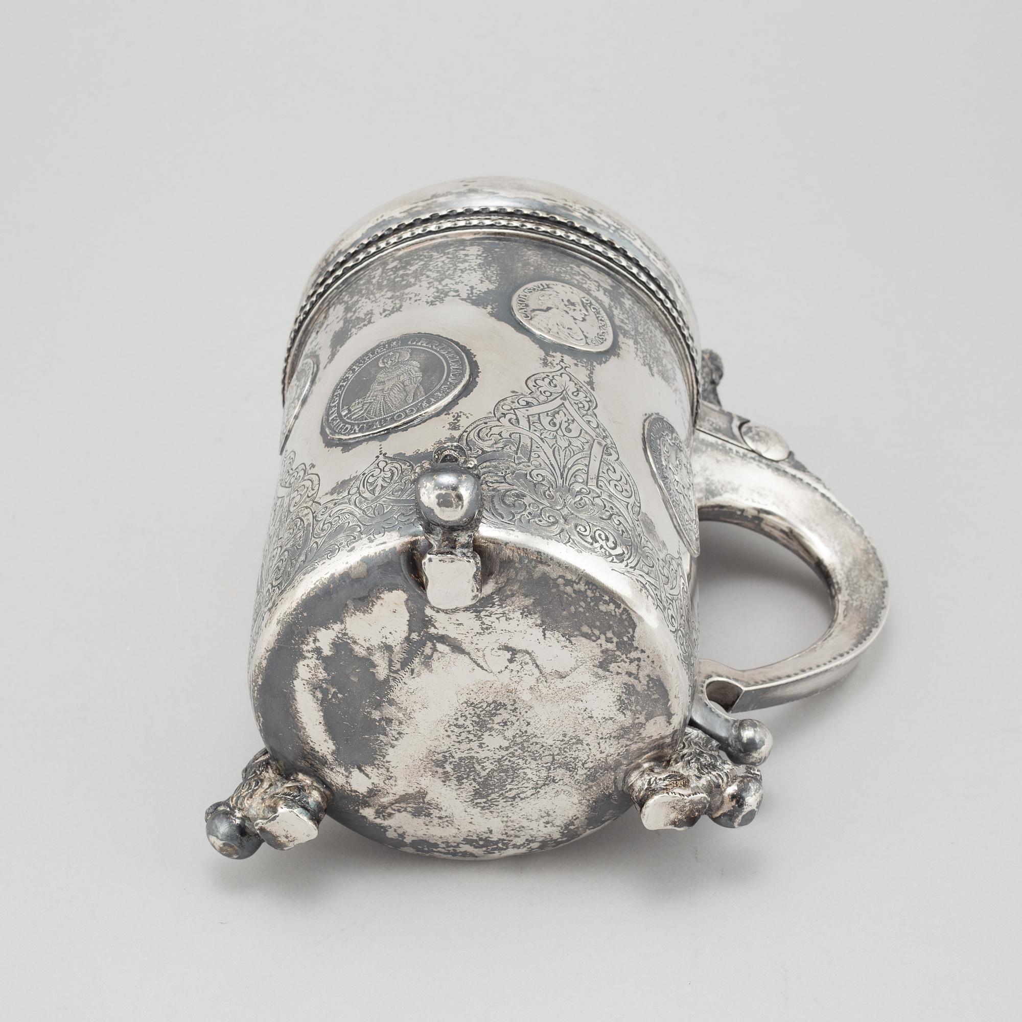 A parcel-gilt silver baroque style tankard.
