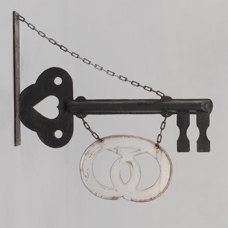 AFFÄRSSKYLT, 1900-talets första hälft.