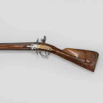 Flintlock rifle, double-barrel "wender" by Philippe de Sellier (1676-1740).