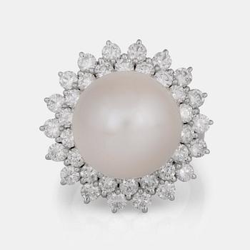 A cultured South Sea pearl and diamond ring.