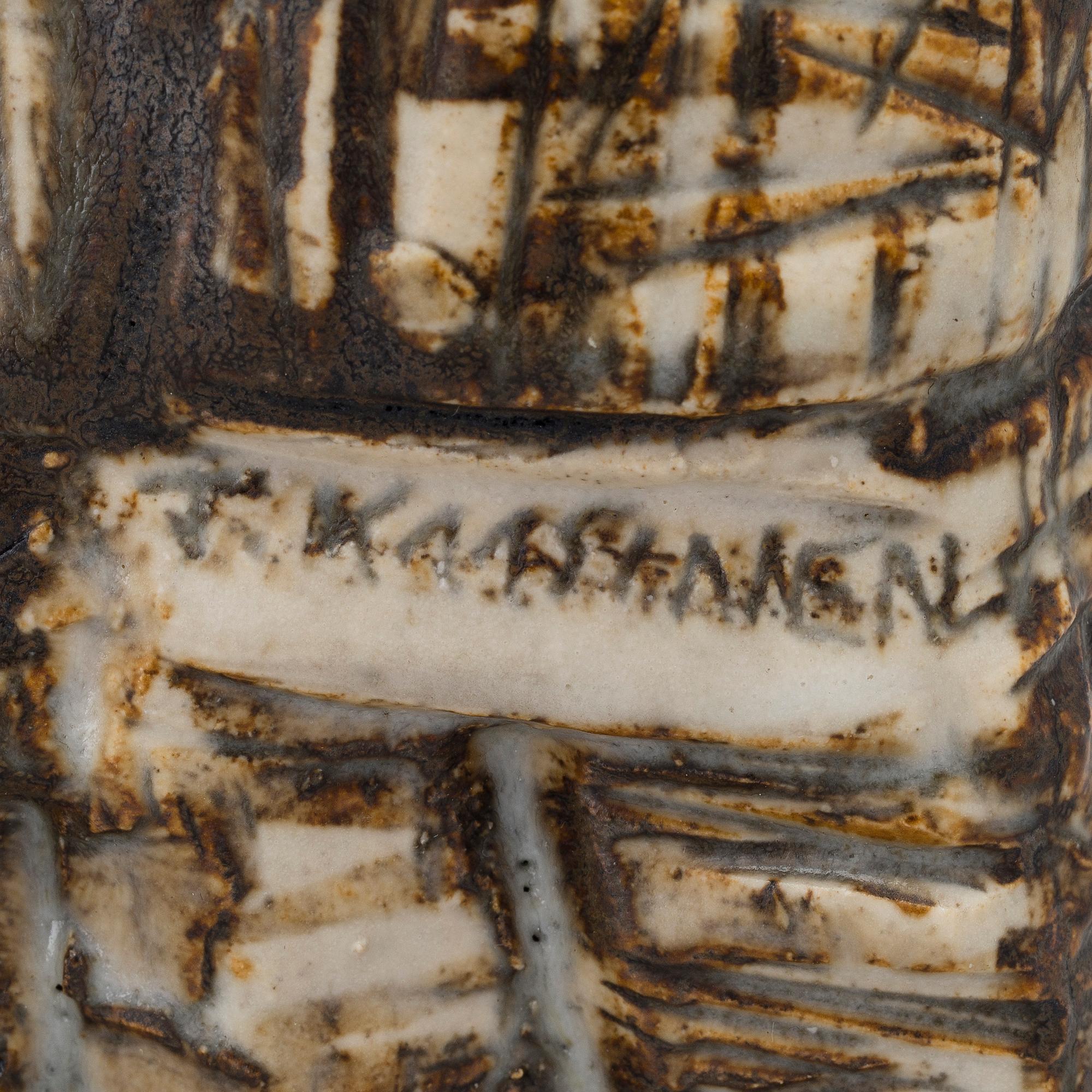 TAISTO KAASINEN, A CERAMIC SCULPTURE. 
Seven Brothers. Sign. Taisto Kaasinen, Arabia Finland.