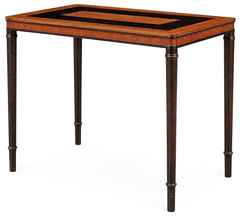 A Carl Malmsten table with inlays executed by Nordiska Kompaniet ca 1925.