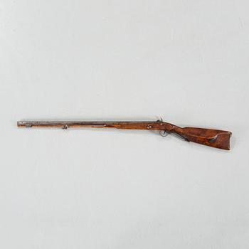 A percussion rifle, around the mid 19th century.