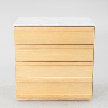 A contemporary chest of drawers.