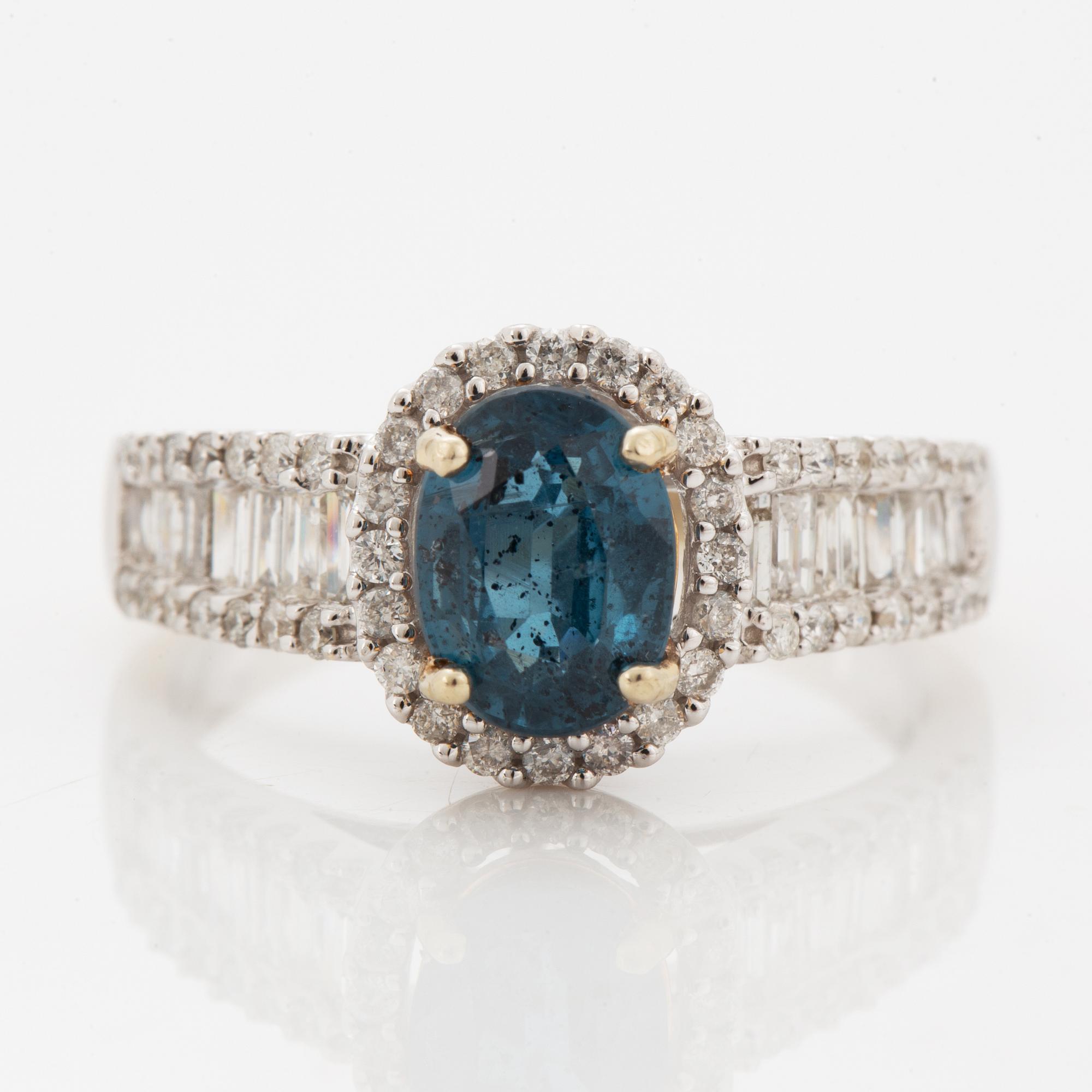 Oval faceted kyanite and diamond ring.