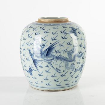 A blue and white 'dragon and phoenix' jar, Qing dynasty/around 1900.