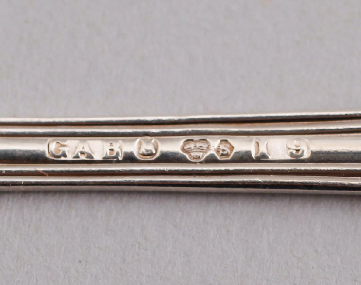 KAFFESKEDAR, 23 st, silver, "Olga", GAB, Stockholm 1950/60-tal. Vikt ca 297 gram.