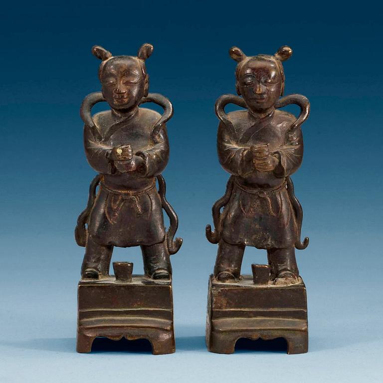 A pair of bronze joss stick holders, Qing dynasty.