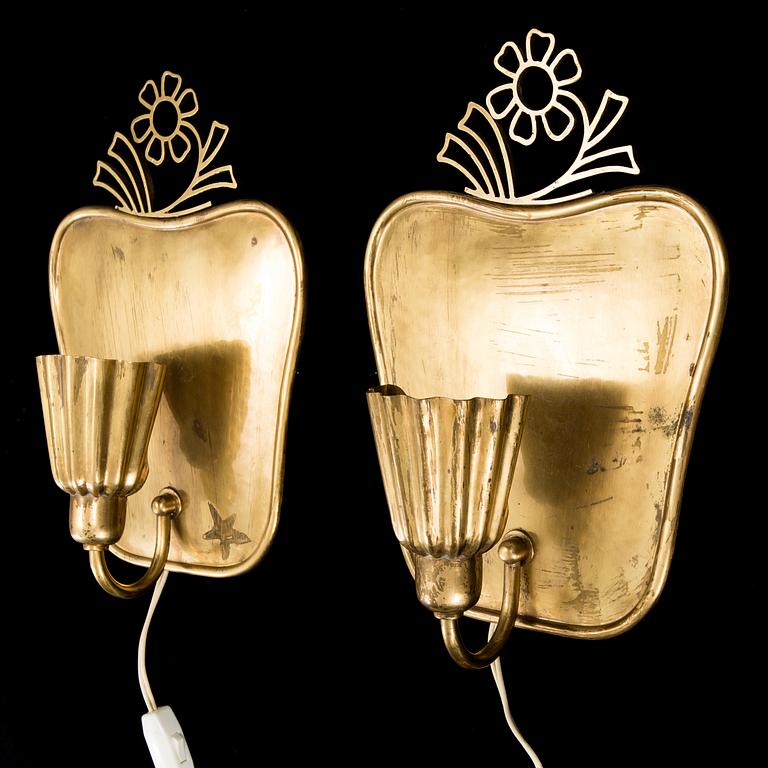 A pair of brass wall-lights by Firma Lars Holström, Arvika.
