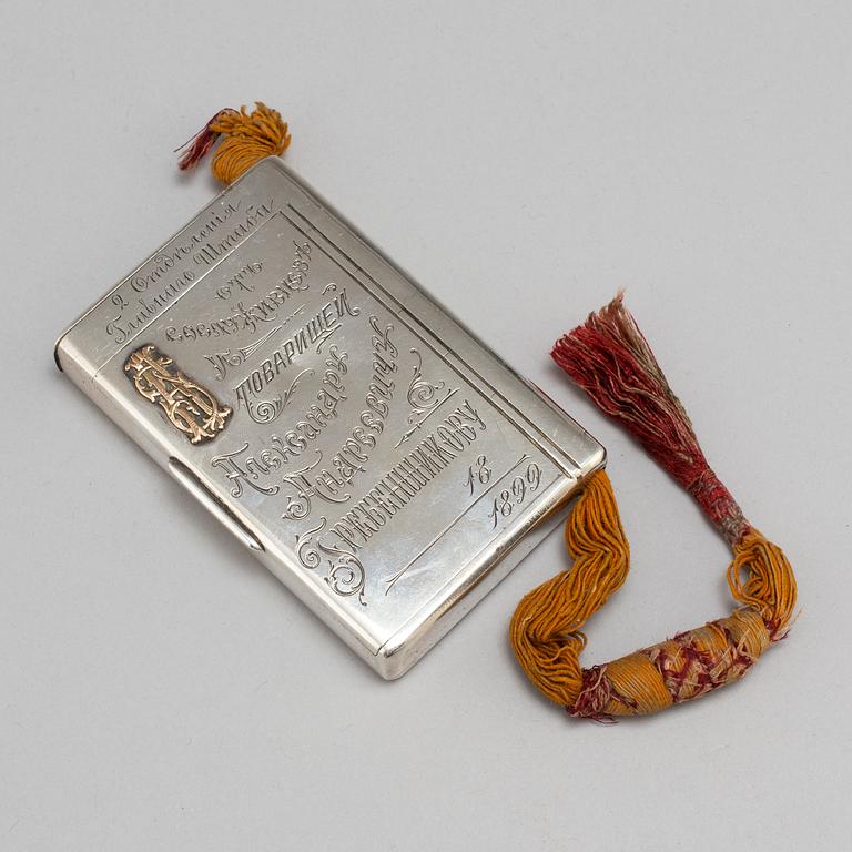 A Russian late 19th century parcel-gilt silver cigarette-case, unidentified makers mark, St. Petersburg.