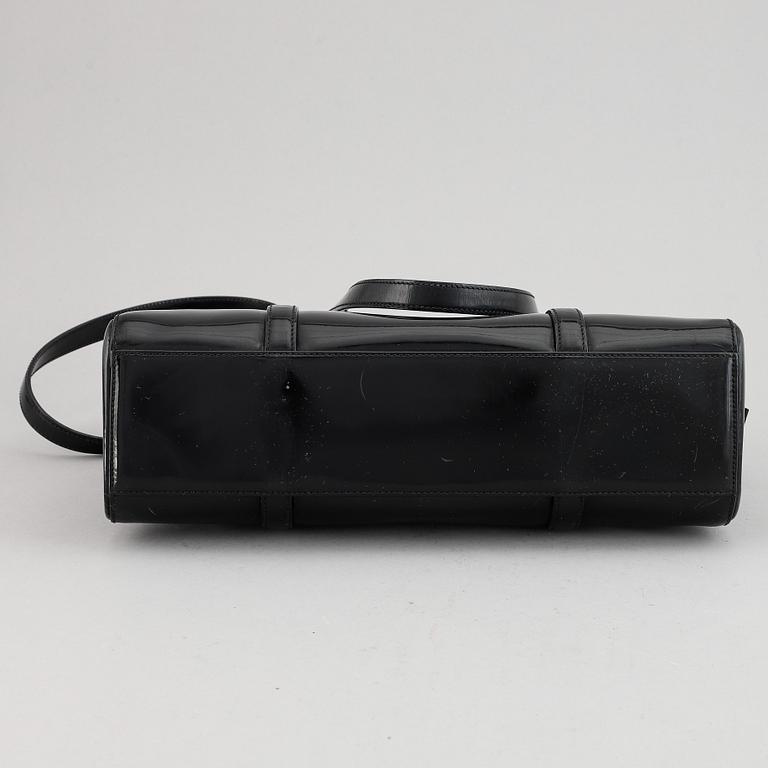 Prada, a patent leather bag.