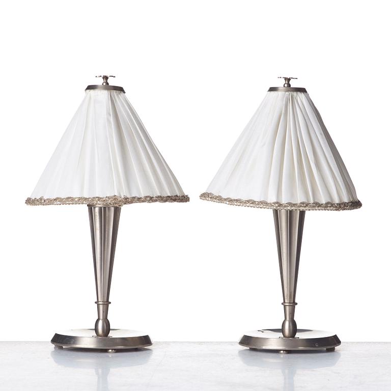 HARALD ELOF NOTINI, a pair of pewter table lamps by Böhlmarks, Stockholm 1920's-30's.