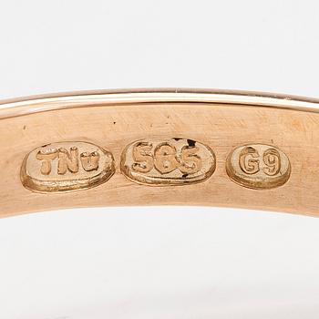 Ring, 14K guld med en modifierad brilliantslipad peridot, Finland 2008.