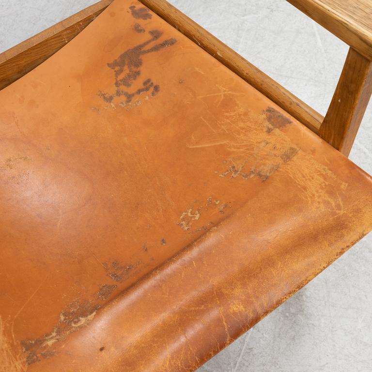 Carl Malmström & Yngve Ekström, a pair of 'Caryngo' oak armchairs, Swedese, second half of the 20th century.
