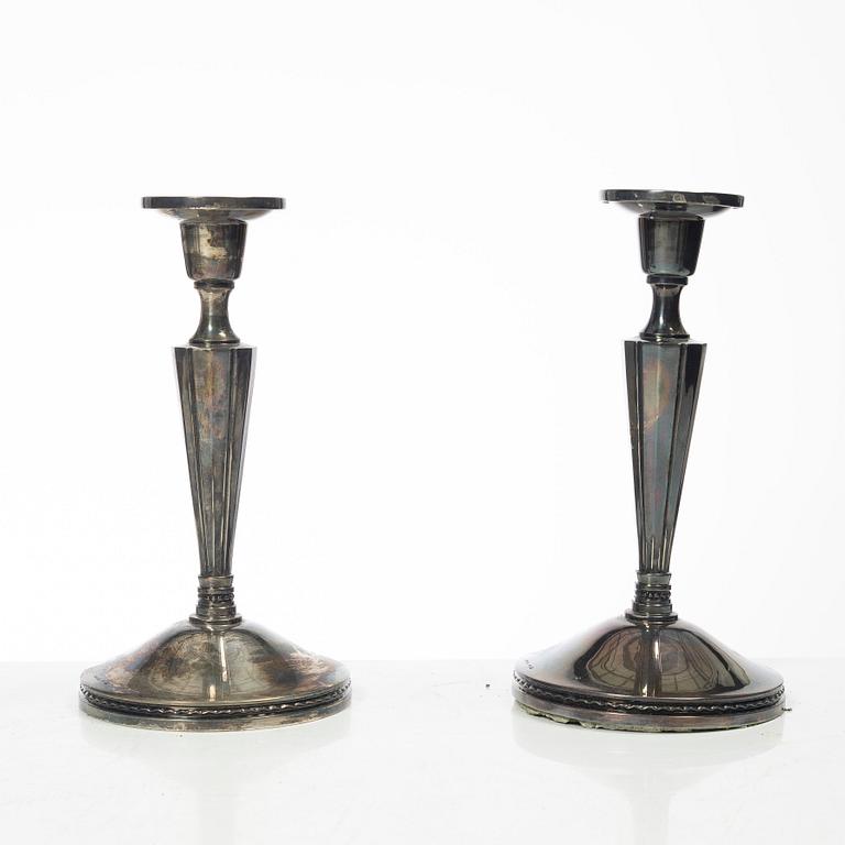 Four pairs och Swedish silver candlesticks, 19th-20th century.