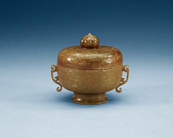 1281. An archaistic jar with cover, China.