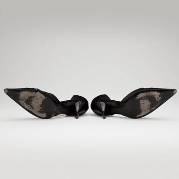 CHRISTIAN LACROIX, a pair of black satin shoes.