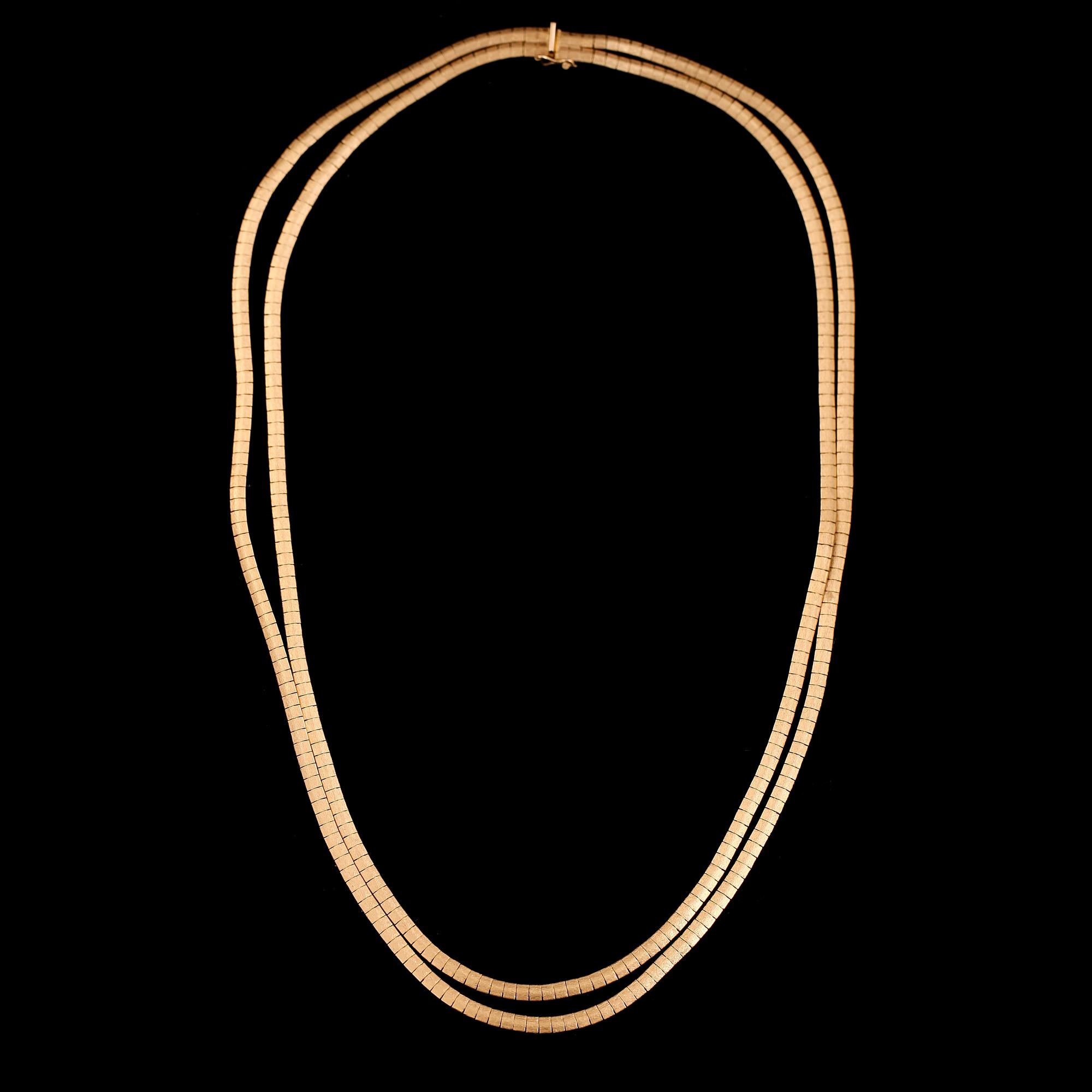 COLLIER, 18K guld. Total vikt ca 29 g.