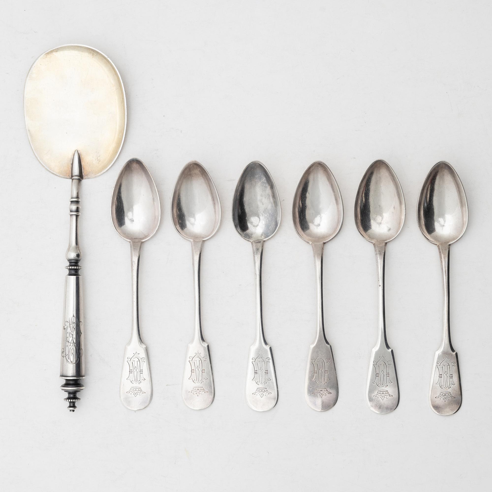A silver server and six spoons, marks of Grachev, St Petersburg, and Helsingfors Juvel- och Filigranab, respectively.