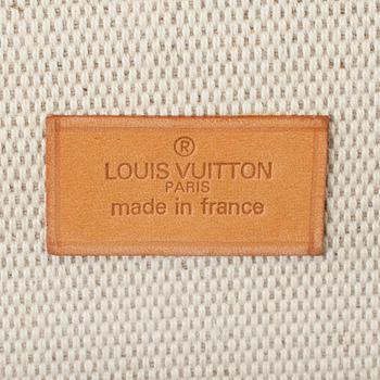 LOUIS VUITTON, a monogram canvas hat box.