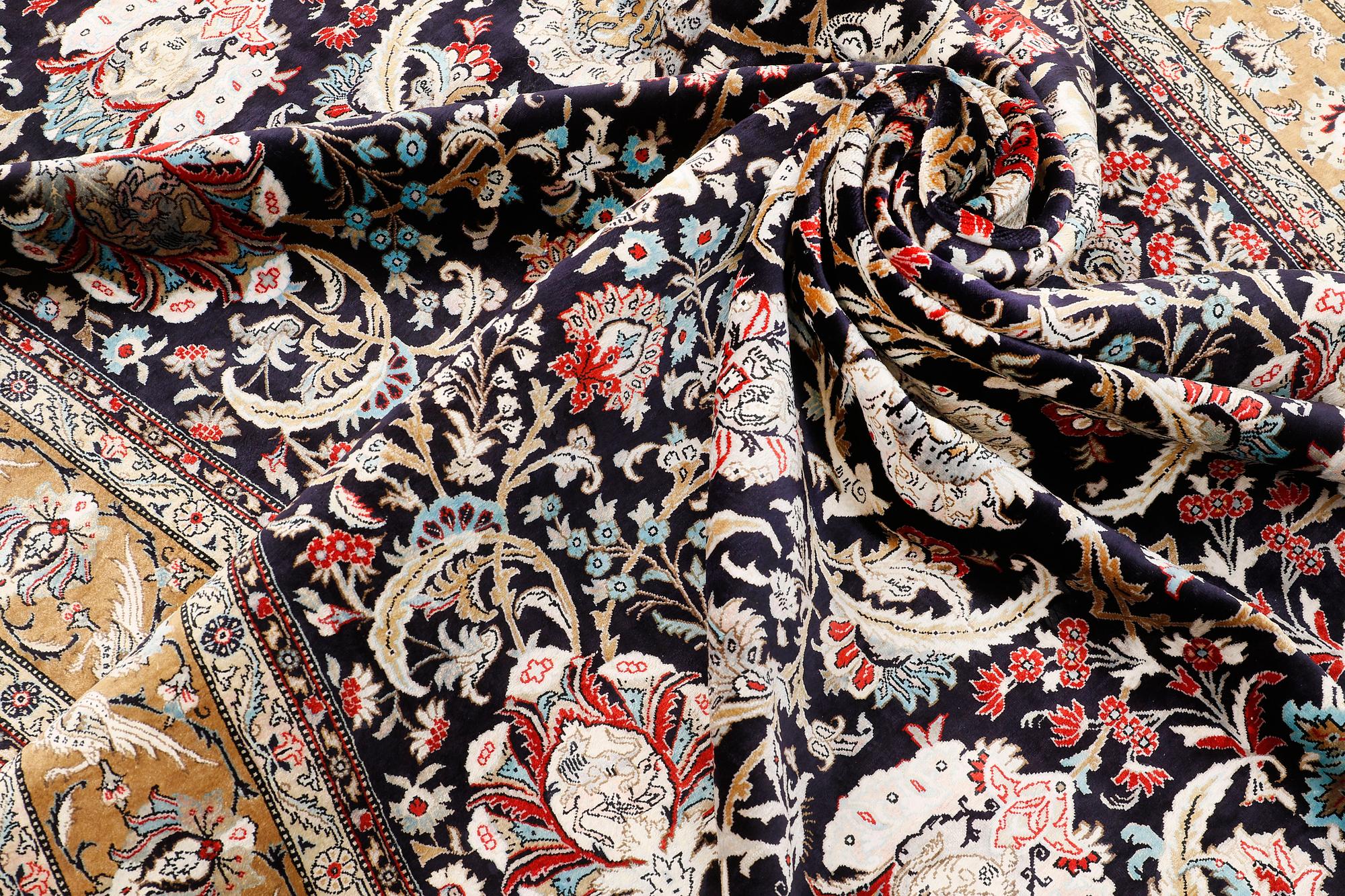 A Ghom silk carpet, approx. 309 x 200 cm.