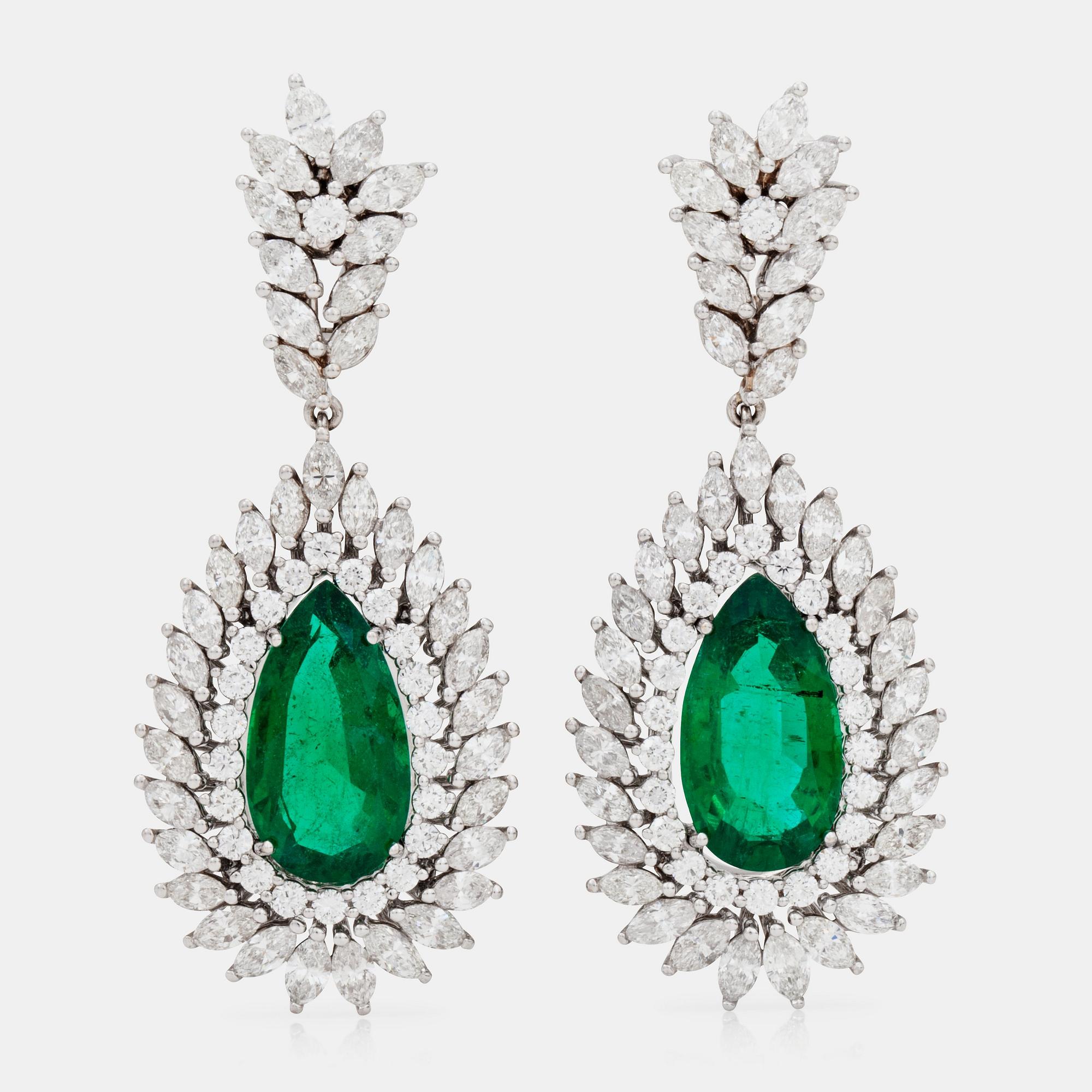 A pair of zambian emerald and diamond earrings.