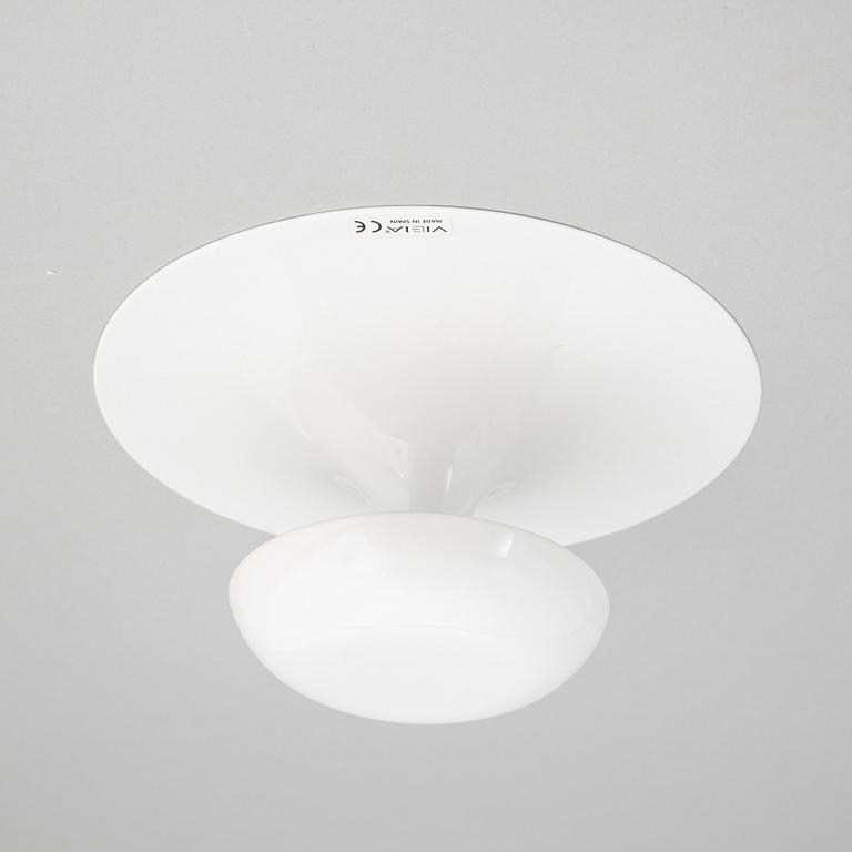 A set of four wall lamps from Vibia, Spain, 21st Century.