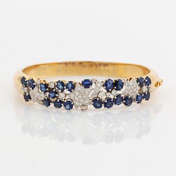 Sapphire and brilliant cut diamond bangle.