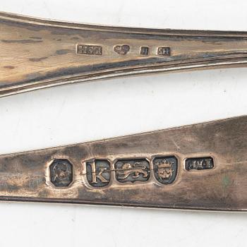 Two pierced silver bowls and two sugar spoons, including Sweden and Endland, 20th century.