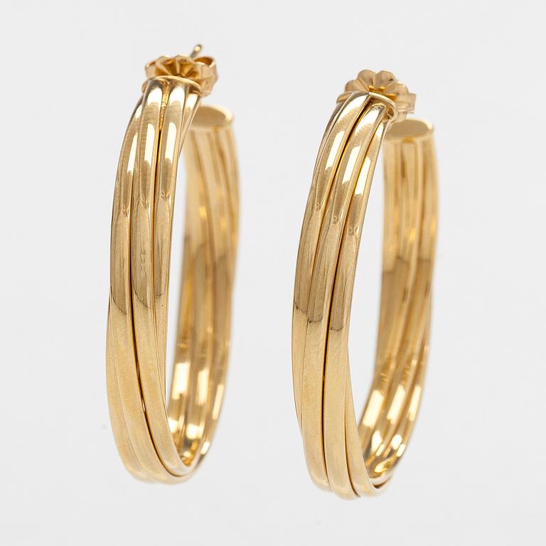Tiffany & Co, Paloma Picasso, "Melody" hoop earrings in 18K gold.