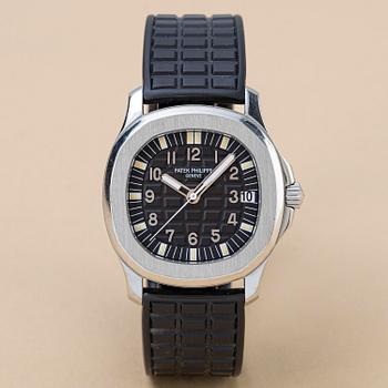 1064. Patek Philippe, Aquanaut, "First generation", "Solid case back", "Nautilus-signed clasp", ca 1997.