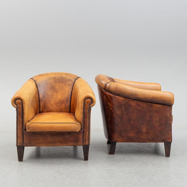 A pair of easy chairs, late 20th century.