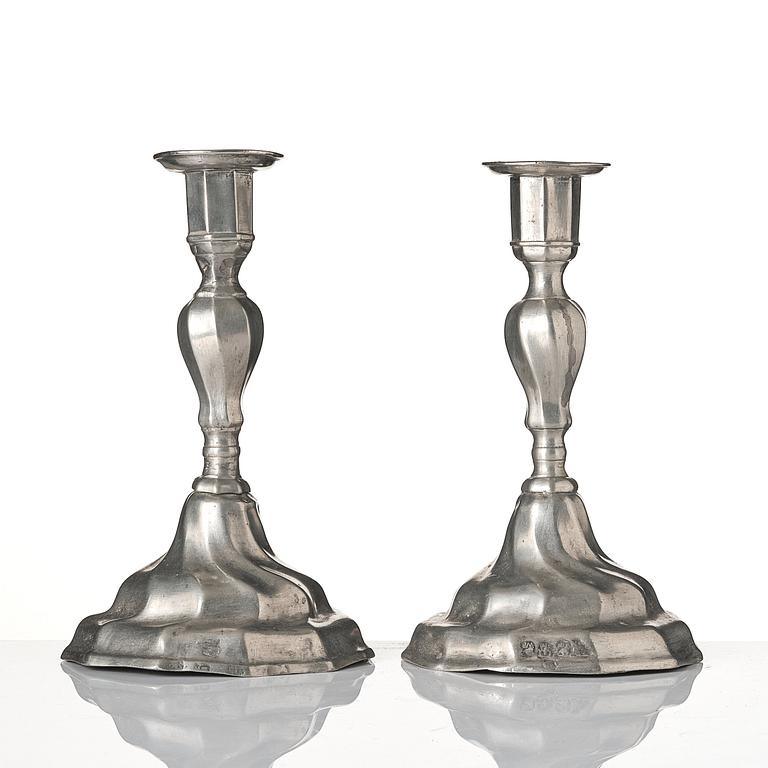 A pair of Rococo pewter candlesticks by G. Östling, Vimmerby (active 1762-90).